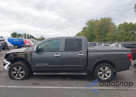 2011 Nissan Titan Sl z USA, uszkodzony, nr VIN 1N6AA0EC0BN318840